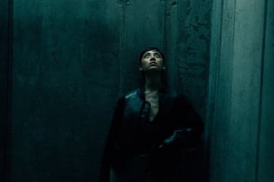 Cinematic Portrait in Teal Industrial Space