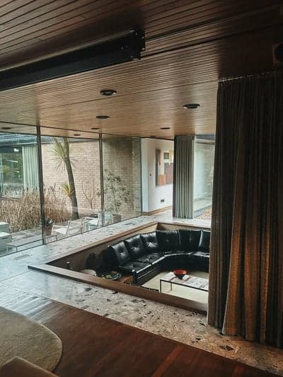 Mid-Century Modern Sunken Living Room with Courtyard View