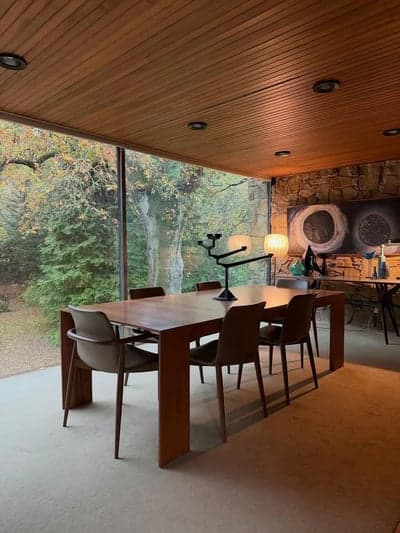 Mid-Century Modern Dining Room with Forest View
