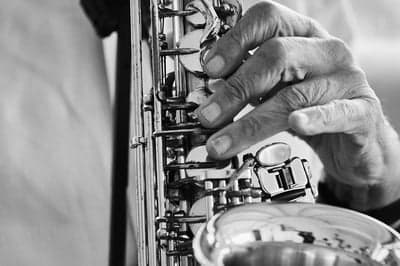 Soulful Hands on a Vintage Saxophone