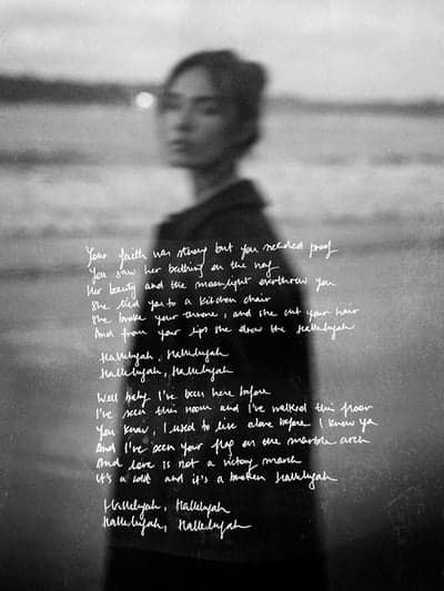 Hallelujah Lyrics Overlaid on Blurred Beach Portrait