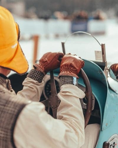 Vintage Racer in a Classic Blue Open-Top Car