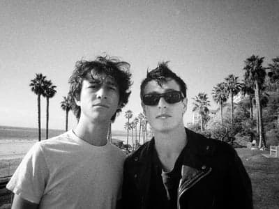 Vintage B&W Portrait of Two Men at the Beach