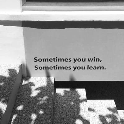 Minimalist Wisdom on Concrete Stairs